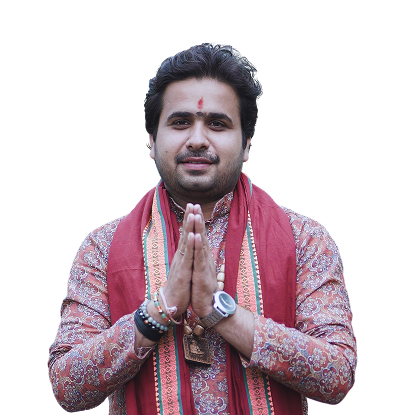 An Indian man in traditional attire greets with folded hands in a namaste gesture against a black background