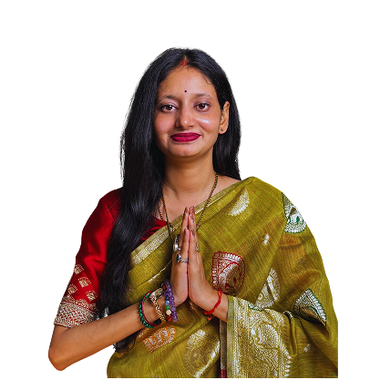 An Indian woman in a traditional saree greets with folded hands in a namaste gesture against a white background.