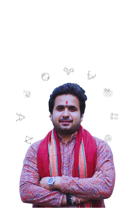 Astrologer standing in front of zodiac wheel with traditional attire and folded arms