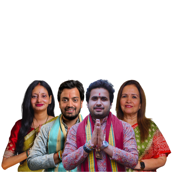 Four people of Indian ethnicity in festive traditional clothing, two men in the center with hands in a namaste greeting, flanked by two smiling women on either side.